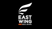 East wing logo image