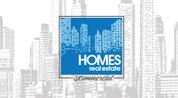 Homes Real Estate & Commercial logo image
