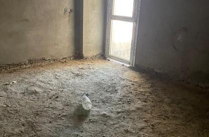Apartment - 3 Bedrooms - 2 Bathrooms for sale in Mohamed Naguib Axis - Abou El Houl - New Cairo City - Cairo