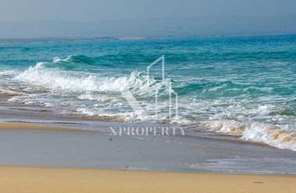 Chalet - 2 Bedrooms - 3 Bathrooms for sale in Ramla Lakeside - Qesm Ad Dabaah - North Coast