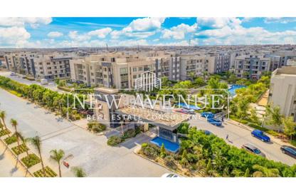 Apartment - 2 Bedrooms - 2 Bathrooms for sale in Galleria Moon Valley - South Investors Area - New Cairo City - Cairo