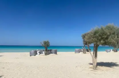 Chalet - 2 Bedrooms - 2 Bathrooms for sale in Beit Al Bahr - Sidi Heneish - North Coast