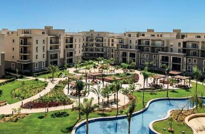Apartment - 2 Bedrooms - 3 Bathrooms for sale in October Plaza - 6 October Compounds - 6 October City - Giza