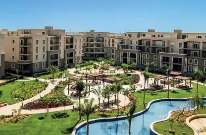 Apartment - 2 Bedrooms - 3 Bathrooms for sale in October Plaza - 6 October Compounds - 6 October City - Giza