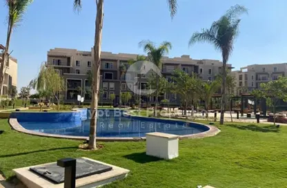 Apartment - 2 Bedrooms - 3 Bathrooms for sale in October Plaza - 6 October Compounds - 6 October City - Giza