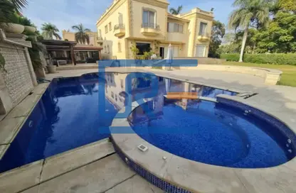 Villa - 5 Bedrooms - 6 Bathrooms for sale in Mena Garden City - Al Motamayez District - 6 October City - Giza