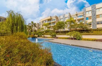 Apartment - 2 Bedrooms - 2 Bathrooms for sale in Galleria Moon Valley - South Investors Area - New Cairo City - Cairo