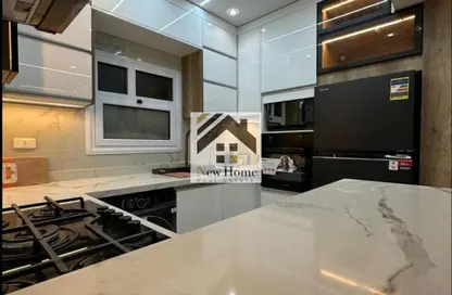 Apartment - 2 Bedrooms - 2 Bathrooms for sale in Al Andalus District - New Cairo City - Cairo