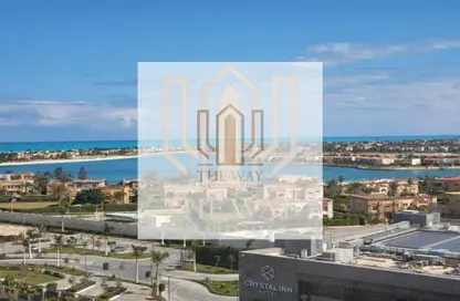 Chalet - 2 Bedrooms - 2 Bathrooms for sale in Mazarine - New Alamein City - Al Alamein - North Coast