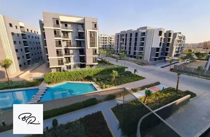 Apartment - 2 Bedrooms - 2 Bathrooms for sale in West Woods - Fayoum Desert road - 6 October City - Giza