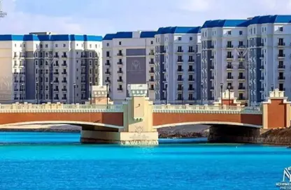 Chalet - 4 Bedrooms - 4 Bathrooms for sale in Latin District - New Alamein City - Al Alamein - North Coast