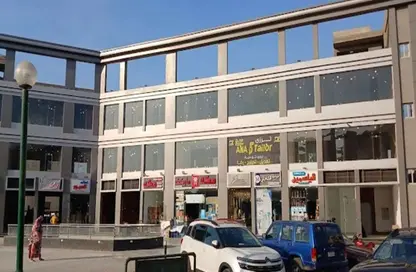 Shop - Studio - 1 Bathroom for sale in Al Amn Al Aam Compound - The 1st Settlement - New Cairo City - Cairo