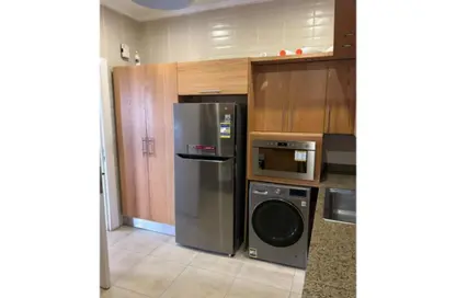 Apartment - 2 Bedrooms - 2 Bathrooms for sale in The Village - South Investors Area - New Cairo City - Cairo