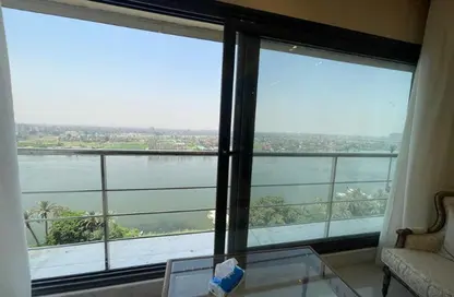 Apartment - 5 Bedrooms - 5 Bathrooms for rent in Nile St. - Dokki - Giza