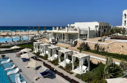 Chalet - 2 Bedrooms - 2 Bathrooms for sale in Ramla Lakeside - Qesm Ad Dabaah - North Coast