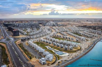 Chalet - 2 Bedrooms - 2 Bathrooms for sale in Latin District - New Alamein City - Al Alamein - North Coast
