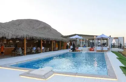 Chalet - 2 Bedrooms - 2 Bathrooms for sale in Jebal Resort - Al Ain Al Sokhna - Suez