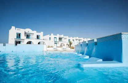 Chalet - 3 Bedrooms - 3 Bathrooms for sale in Latin District - New Alamein City - Al Alamein - North Coast