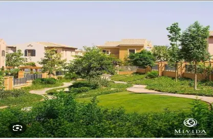 Twin House - 4 Bedrooms - 5 Bathrooms for sale in Mivida - 5th Settlement Compounds - The 5th Settlement - New Cairo City - Cairo