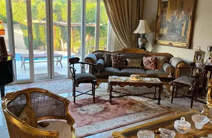 Villa - 5 Bedrooms - 5 Bathrooms for sale in Mena Garden City - Al Motamayez District - 6 October City - Giza