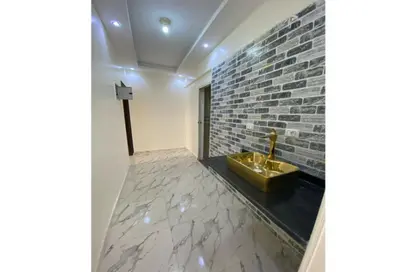 سطح - 2 غرف نوم - 1 حمام للايجار في شارع عتمان - الحي التاسع - الشيخ زايد - الجيزة