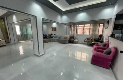 Apartment - 2 Bedrooms - 2 Bathrooms for sale in Hussein Ahmed Rashad St. - Dokki - Giza