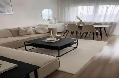 Apartment - 2 Bedrooms - 2 Bathrooms for sale in Swan Lake Residence - 5th Settlement Compounds - The 5th Settlement - New Cairo City - Cairo