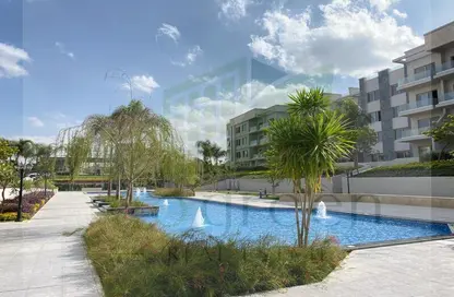 Apartment - 2 Bedrooms - 2 Bathrooms for sale in Galleria Moon Valley - South Investors Area - New Cairo City - Cairo