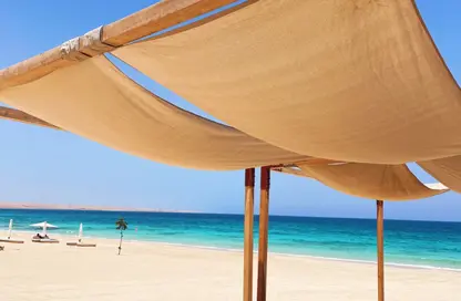 Chalet - 2 Bedrooms - 2 Bathrooms for sale in Ramla Lakeside - Qesm Ad Dabaah - North Coast