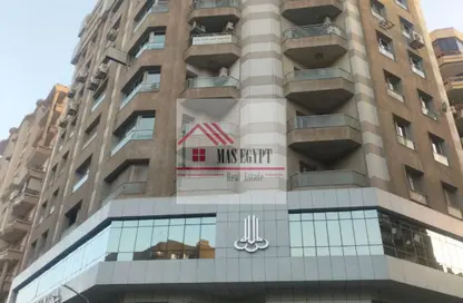 محل تجاري - استوديو - 2 حمامات للايجار في شارع عمان - الدقي - الجيزة