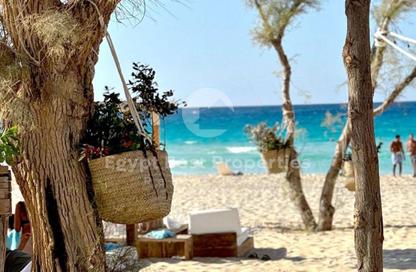 Chalet - 2 Bedrooms - 2 Bathrooms for sale in Beit Al Bahr - Sidi Heneish - North Coast