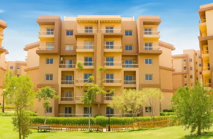 Apartment - 3 Bedrooms - 2 Bathrooms for sale in Garden Gate - Ashgar City - Al Wahat Road - 6 October City - Giza