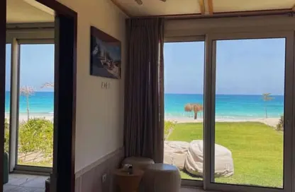 Chalet - 2 Bedrooms - 2 Bathrooms for sale in Ramla Lakeside - Qesm Ad Dabaah - North Coast