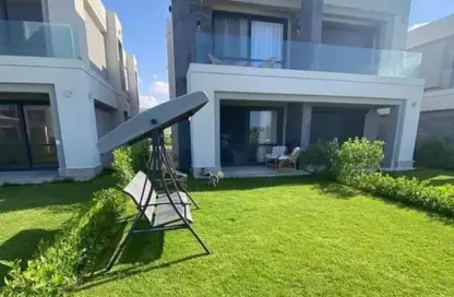 Villa - 4 Bedrooms - 4 Bathrooms for sale in Swan Lake North Coast - Qesm Ad Dabaah - North Coast