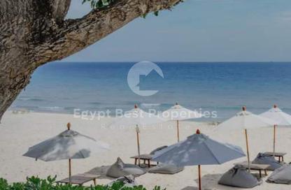 Chalet - 2 Bedrooms - 2 Bathrooms for sale in Swan Lake North Coast - Qesm Ad Dabaah - North Coast