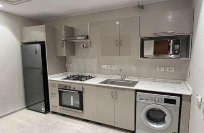 Hotel Apartment - 3 Bedrooms - 3 Bathrooms for sale in Aeon - 6 October Compounds - 6 October City - Giza