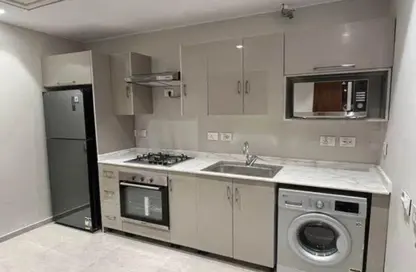 Hotel Apartment - 3 Bedrooms - 3 Bathrooms for sale in Aeon - 6 October Compounds - 6 October City - Giza