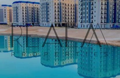 Apartment - 2 Bedrooms - 2 Bathrooms for sale in Latin District - New Alamein City - Al Alamein - North Coast