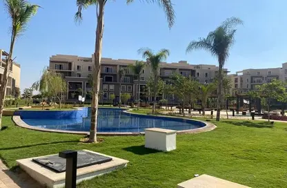 Apartment - 2 Bedrooms - 3 Bathrooms for sale in October Plaza - 6 October Compounds - 6 October City - Giza