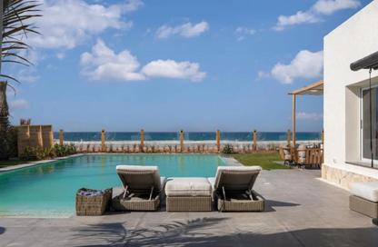 Chalet - 2 Bedrooms - 2 Bathrooms for sale in Remal - Ras Al Hekma - North Coast