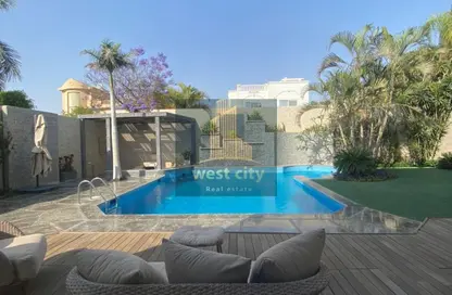 Villa - 4 Bedrooms - 4 Bathrooms for sale in Mena Garden City - Al Motamayez District - 6 October City - Giza