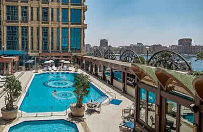 Apartment - 4 Bedrooms - 4 Bathrooms for sale in Nile St. - Dokki - Giza
