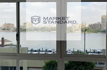 Apartment - 2 Bedrooms - 2 Bathrooms for sale in Nile St. - Dokki - Giza