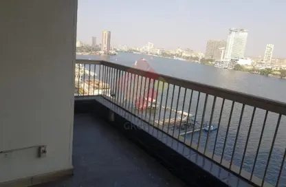شقة - 4 غرف نوم - 5 حمامات للايجار في شارع النيل - الدقي - الجيزة