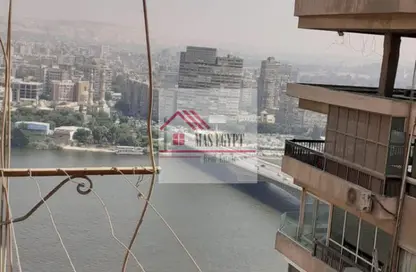 Apartment - 3 Bedrooms - 3 Bathrooms for sale in Nile St. - Dokki - Giza