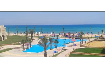 Chalet - 2 Bedrooms - 1 Bathroom for sale in Lasirena Palm Beach - Al Ain Al Sokhna - Suez