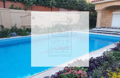 Villa - 6 Bathrooms for sale in Green Hills - 26th of July Corridor - 6 October City - Giza
