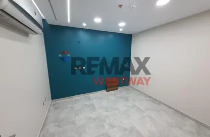 Office Space - Studio - 1 Bathroom for rent in Arkan Plaza - 26th of July Corridor - Sheikh Zayed City - Giza