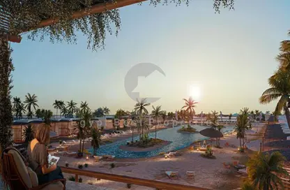 Chalet - 2 Bedrooms - 3 Bathrooms for sale in Ramla Lakeside - Qesm Ad Dabaah - North Coast