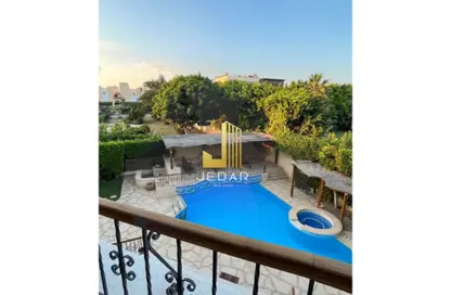 Villa - 5 Bedrooms - 7 Bathrooms for sale in Mena Garden City - Al Motamayez District - 6 October City - Giza